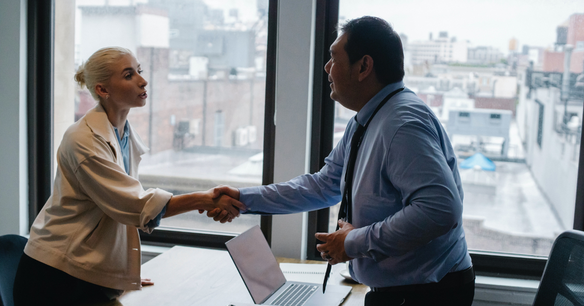 two people shaking hands