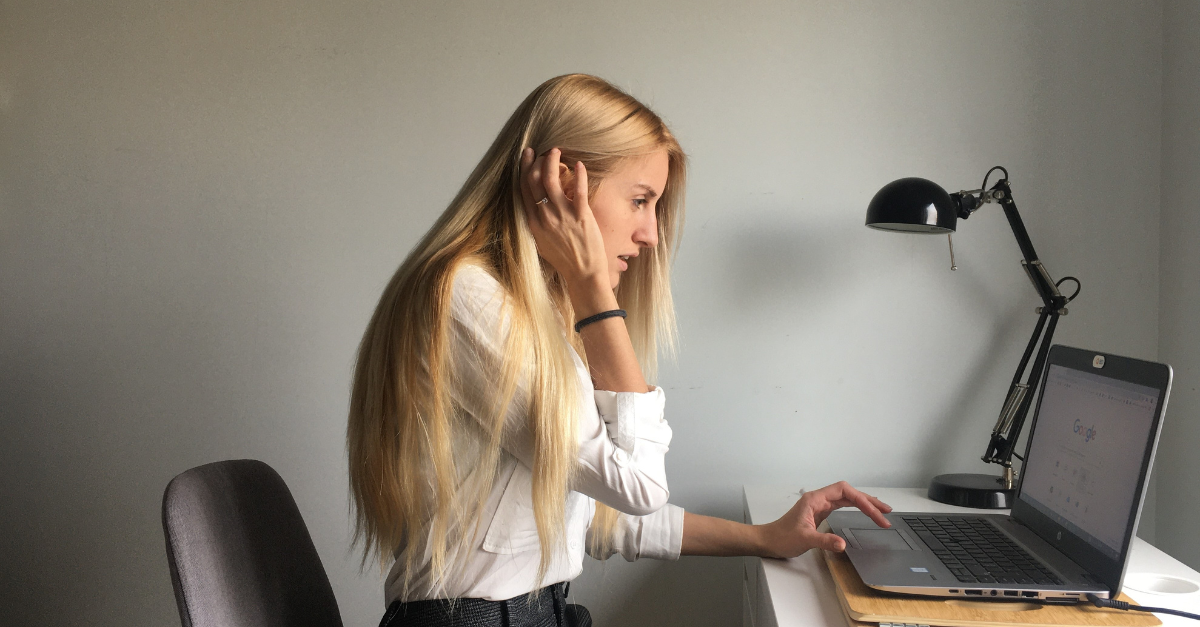 woman looking at computer