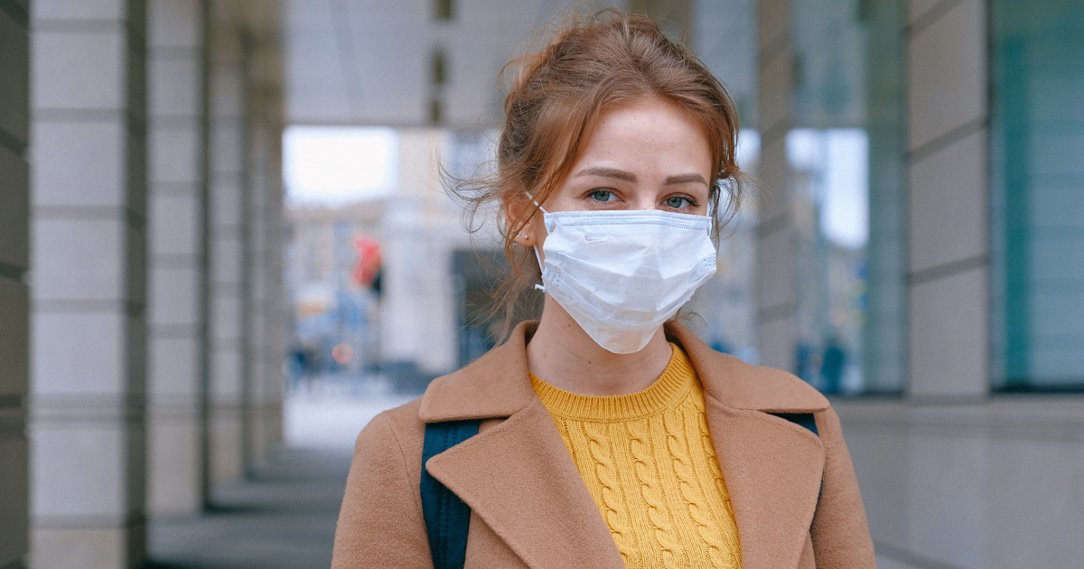 woman wearing a mask outside