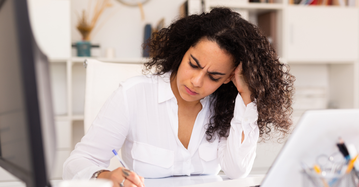 woman frustrated in front of laptop